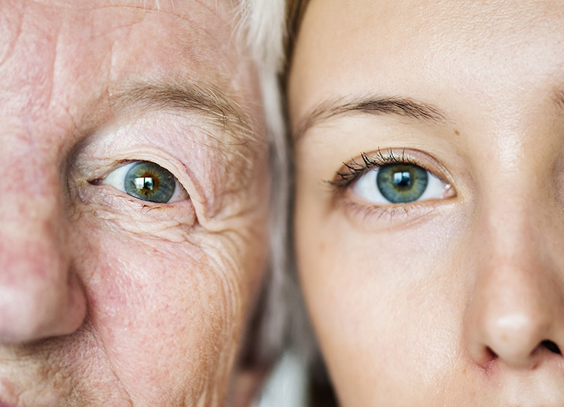 side by side facial view of a younger and older woman